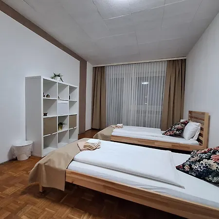 Quarto em Acomodações Particulares Brightcenterapartment